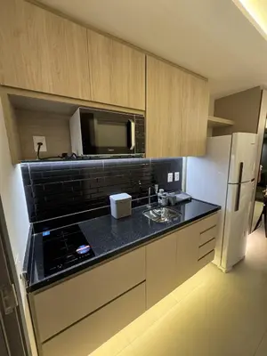 A cozinha ou kitchenette de Apartamento studio novo completo - Beach Class Meireles