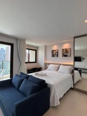Uma cama ou camas num quarto em Exclusividade e Conforto a 500m da Beira-Mar
