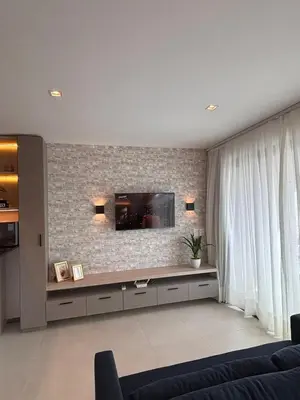 Uma televisão e/ou sistema de entretenimento em Exclusividade e Conforto a 500m da Beira-Mar