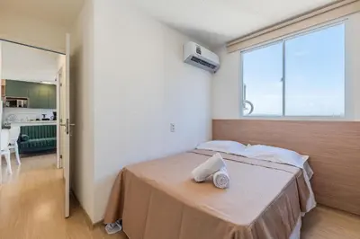 Uma cama ou camas num quarto em Mirante #1305 - Praia do Futuro por Carpediem