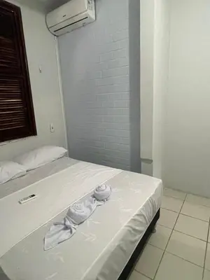 Uma cama ou camas num quarto em Pousada Casa Bali