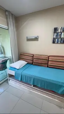 Uma cama ou camas num quarto em Vg Fun 142