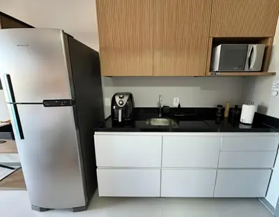 A cozinha ou kitchenette de Studio 500m da Praia - Piscina com Vista Incrível