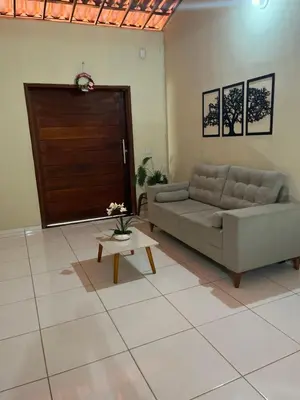 Uma área de estar em Aconchego Feliz