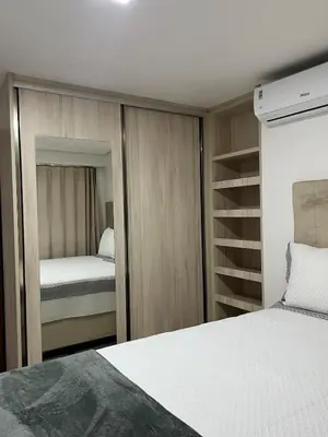 Uma cama ou camas num quarto em BeachClass Fortaleza 200m da Praia Aterro Iracema