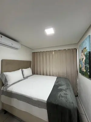 Uma cama ou camas num quarto em BeachClass Fortaleza 200m da Praia Aterro Iracema