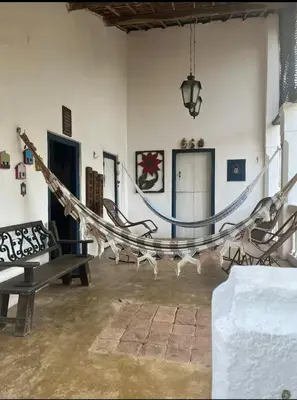 Uma área de estar em Recanto Cravo & Canela