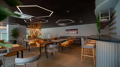 Uma área de estar em Studio Elegante no Meireles a Poucos Passos do Mar