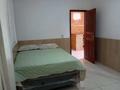 Uma cama ou camas num quarto em AP Morro Branco