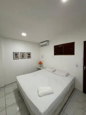 Uma cama ou camas num quarto em Suites Premium Jacarey, Fortaleza