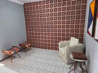 Uma área de estar em Suites Premium Jacarey, Fortaleza