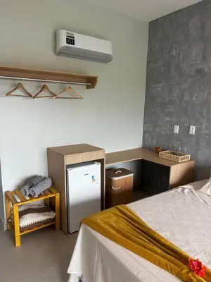 Uma cama ou camas num quarto em Villa brisa Icaraízinho quarto 8 1 andar