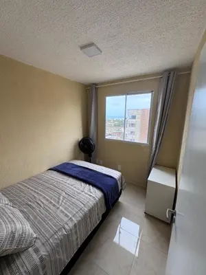 Uma cama ou camas num quarto em Apartamento pé na areia- Praia do futuro