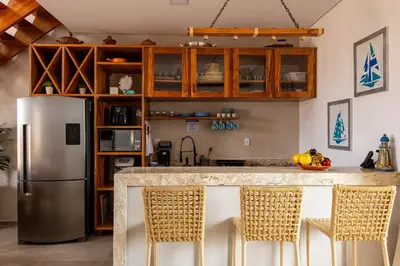 A cozinha ou kitchenette de Unforgettable Sunsets 4BR Retreat with Pool in Prea
