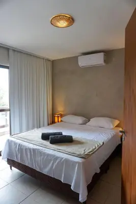 Uma cama ou camas num quarto em Cumbuco Dream Village 802V - Vista e brisa do mar