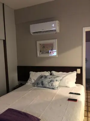 Uma cama ou camas num quarto em Hotel Golden Fortaleza para vista mar