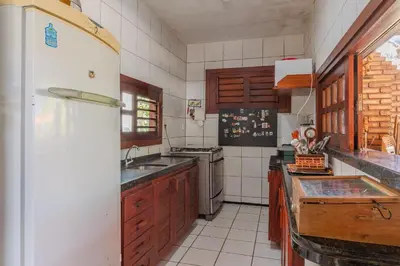 A cozinha ou kitchenette de Mansão Bomfim Tabuba | Lazer Completo by Carpediem