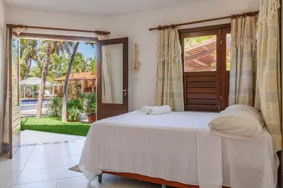 Uma cama ou camas num quarto em Mansão Bomfim Tabuba | Lazer Completo by Carpediem