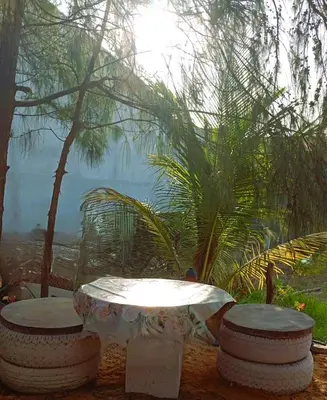 Um jardim no exterior de Casa do Sol Nascente em Aguas Belas CE