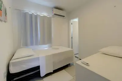 Uma cama ou camas num quarto em Beach Townhouses I Triplex Perto da Praia By Carpediem