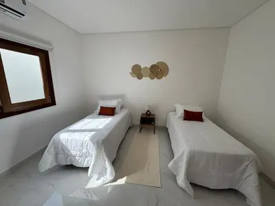 Uma cama ou camas num quarto em Casa - Elo Beach House