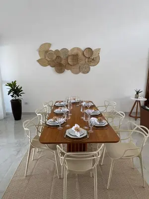 Uma área de estar em Casa - Elo Beach House