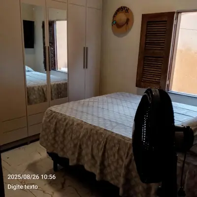 Uma cama ou camas num quarto em Aconchego particular