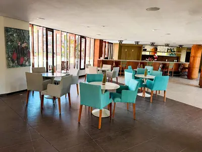 Uma área de estar em Kariri beach apt 427 Praia do Cumbuco