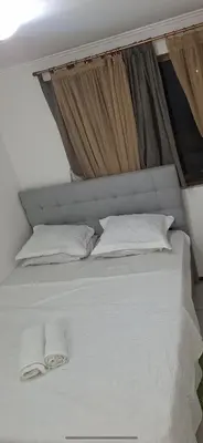 Uma cama ou camas num quarto em Sol &praia