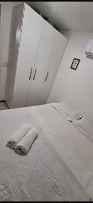 Uma cama ou camas num quarto em Sol &praia