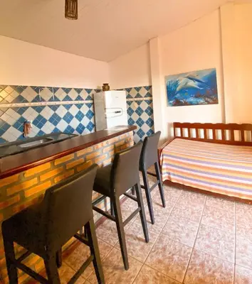 Uma área de estar em Villa Jerico Pousada