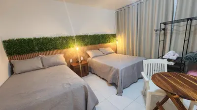 Uma cama ou camas num quarto em Casa Jo Fortim