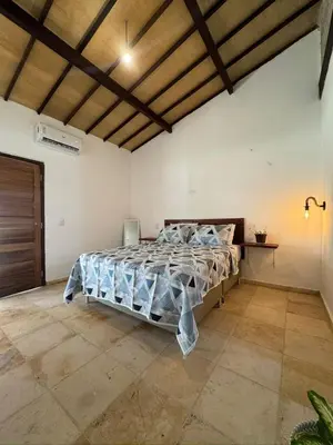 Uma cama ou camas num quarto em Casa na Pinguela