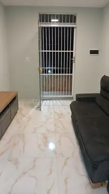 Uma área de estar em Apartamento à 1km da praia da Icaraí