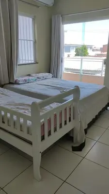 Uma cama ou camas num quarto em Trairí House