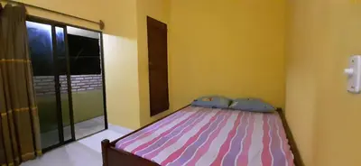 Uma cama ou camas num quarto em casa n 2 jeri