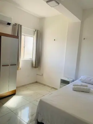 Uma cama ou camas num quarto em Apartamento inteiro para Casal 404