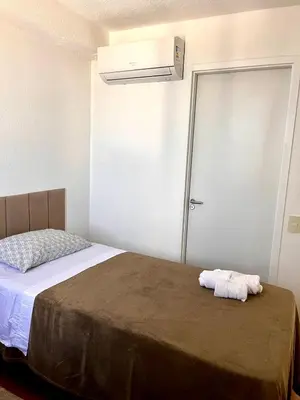 Uma cama ou camas num quarto em Mirante Condominio Clube