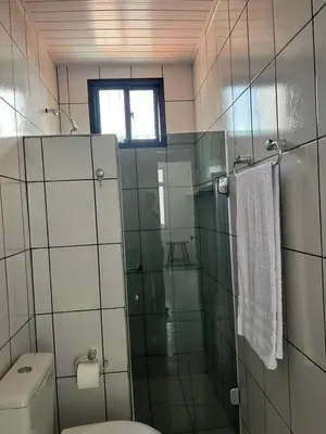 Uma casa de banho em 1 Quarto passos da praia