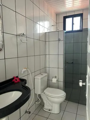 Uma casa de banho em 1 Quarto passos da praia