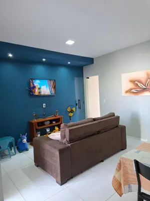 Uma área de estar em Conforto pé na areia