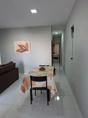 Uma área de estar em Conforto pé na areia