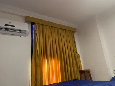 Uma cama ou camas num quarto em Cat friendly