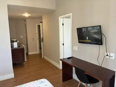 Uma televisão e/ou sistema de entretenimento em Apart-Hotel Vista Mar - Golden Fortaleza