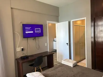 Uma televisão e/ou sistema de entretenimento em Apart-Hotel Vista Mar - Golden Fortaleza