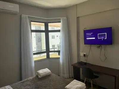 Uma televisão e/ou sistema de entretenimento em Apart-Hotel Vista Mar - Golden Fortaleza