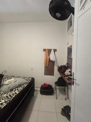 Uma cama ou camas num quarto em Casa Maúna