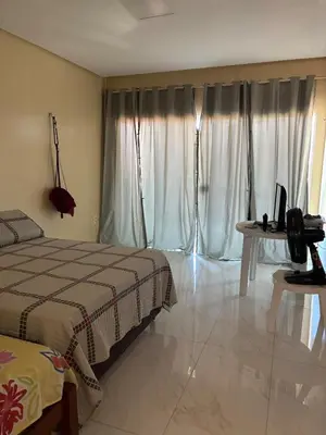 Uma cama ou camas num quarto em Casa Paracuru