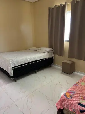 Uma cama ou camas num quarto em Casa Paracuru