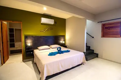 Uma cama ou camas num quarto em Casa Ananda Hotel Boutique